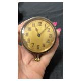 Antique eight day automotive clock