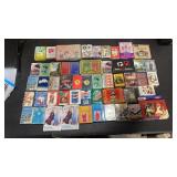 49 sets of playing cards.  Some sealed