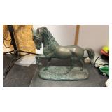 Bronze sculpture of a stallion horse