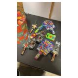 Tin full of misc. Candy holders untested and kids