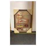 Framed collection of parts of cigar box labels