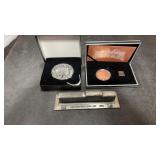 2 Railroad medallions and desk weight