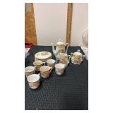 Tea pot, set with 6  tea cups and plates  stamped