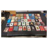 48 misc. decks of cards.  Some sealed