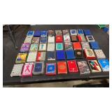 45 misc. playing cards.  Some sealed