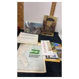 Group of railroad books , maps and conductors