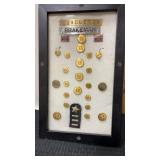 Shadow box of Burlington route Buttons, pins and