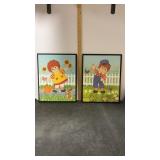 2 Raggedy Ann Framed Pictures. Approx.