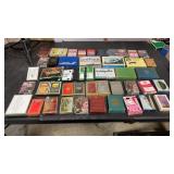 40 misc playing cards. Some sealed