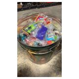 Popcorn tin full of unopened kids happy meal kids