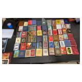 60 sets of playing cards.  Some sealed
