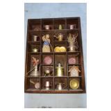 Shadow box with trinkets.  Glued inside
