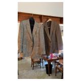 2 jackets with unknown sizes