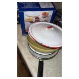 Heat and  serve bowls  , miscellaneous pans and