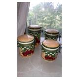 Ceramic canister set with apple decorations