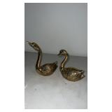 Brass swan figures