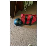 Brunswick bowling ball and red bag