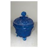 Jeanette glass, blue tri footed, candle dish with