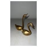 Brass swan figures