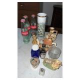 Group of miscellaneous decorations and Coca Cola