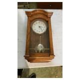 Linden Wall Clock with broken pendulum mount.