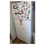 Refrigerator  and magnets approximately  27.5 x