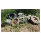 Pile of tires and wheels.  Used as is