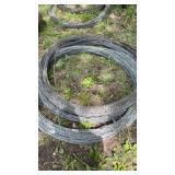 Stack of 3 unknown length rolls of Barbwire