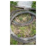 Stack of 3 unknown length rolls of Barbwire