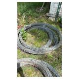 Stack of 3 unknown length rolls of Barbwire