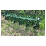 John Deere Row Cultivar aprox. 10-12 foot.  Needs