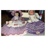2 dolls with crocheted dresses  1 out fit is made