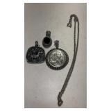 3 silvertone pendants and 1 silvertone chain