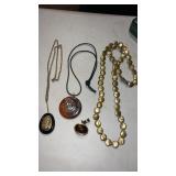 3 necklaces and 1 gold tone pendant