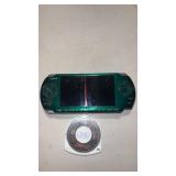 Green psp hand held video game.  No charger.