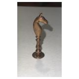 Small brass pipe tamper as horses head or chess