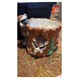 Ceramic planter pot with baby raccoons