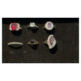 5 silver tome and 1 gold tone  womanï¿½s rings