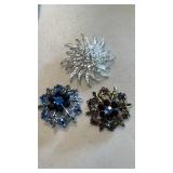 Silver and gold tone ladies brooches