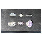 6 silver tone womanï¿½s rings