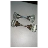 2 glass door knobs