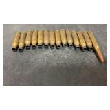 1 270win. Cartridge & 13 Spent brass 243win