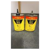 2 Vintage metal Outers 445 Gun Oil.  Shows wear