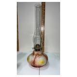 Antique oil lamp  the base features a molded