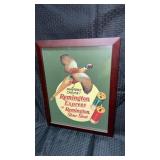 Framed vintage advertising art for Remington