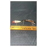 Vintage wood single hook fishing lure and  Heddon