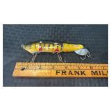 Mud puppy scarce tiger stripe paint fishing lure.