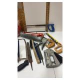 Caulking gun, saws , staple gun and more tools