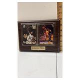Shaquille O ï¿½ Neal basketball cards on wooden