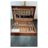 64 pieces of Stainless Flatware in wood box